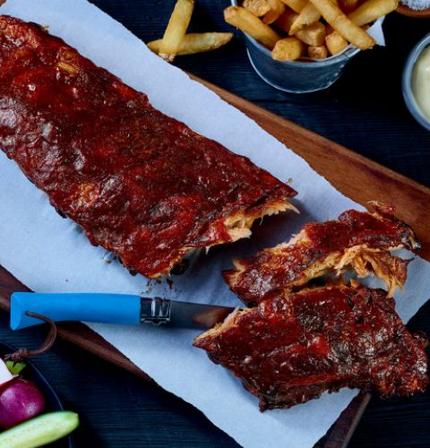 Pork back ribs with BBQ sauce, fully cooked