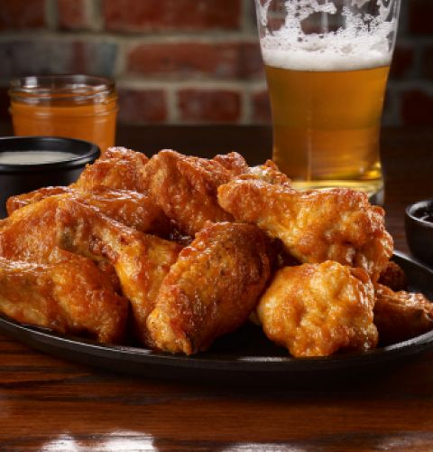 Seasoned chicken wings roadhouse style, fully cooked